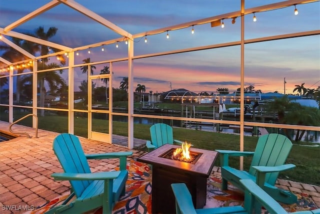 unfurnished sunroom with rail lighting