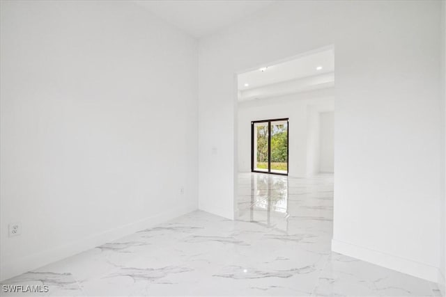 1436 Graham Cir, Lehigh Acres, FL 33936 - spare room featuring recessed lighting, marble finish floor, and baseboards