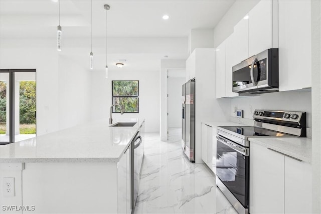 1436 Graham Cir, Lehigh Acres, FL 33936 - kitchen with stainless steel appliances, modern cabinets, marble finish floor, and a sink