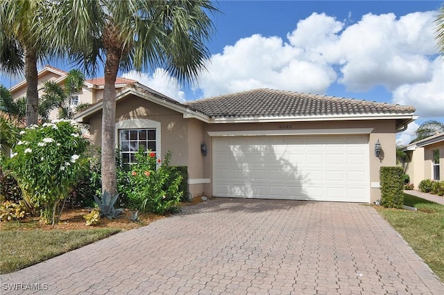 view of front of property featuring a garage