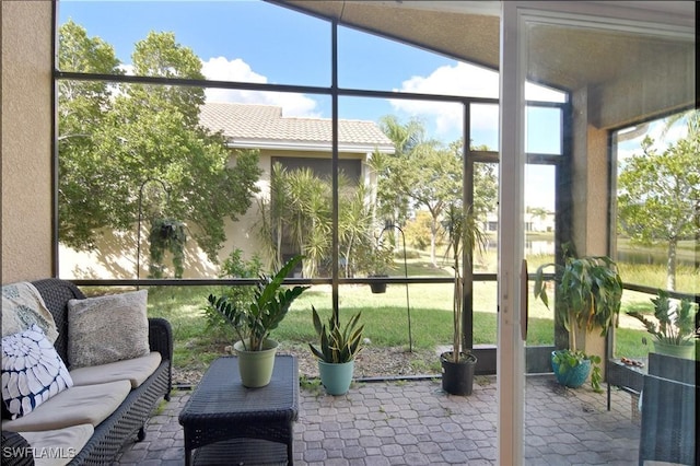 unfurnished sunroom with a healthy amount of sunlight