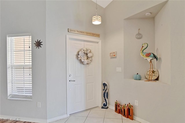 view of tiled foyer entrance