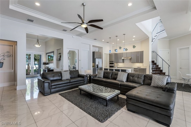 living room featuring ceiling fan, french doors, sink, crown molding, and a towering ceiling