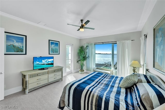 bedroom with multiple windows, ornamental molding, and ceiling fan