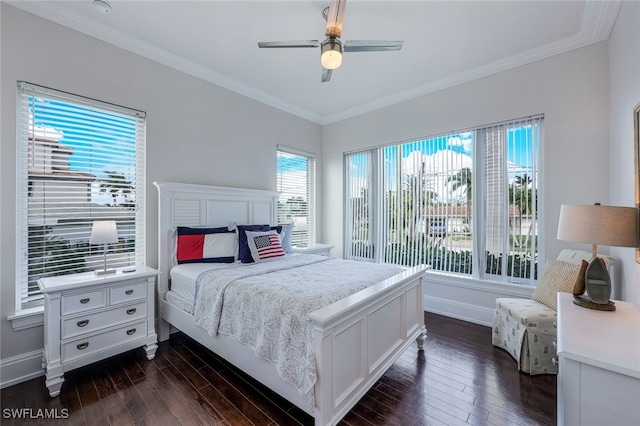 bedroom featuring ceiling fan, dark hardwood / wood-style flooring, and ornamental molding