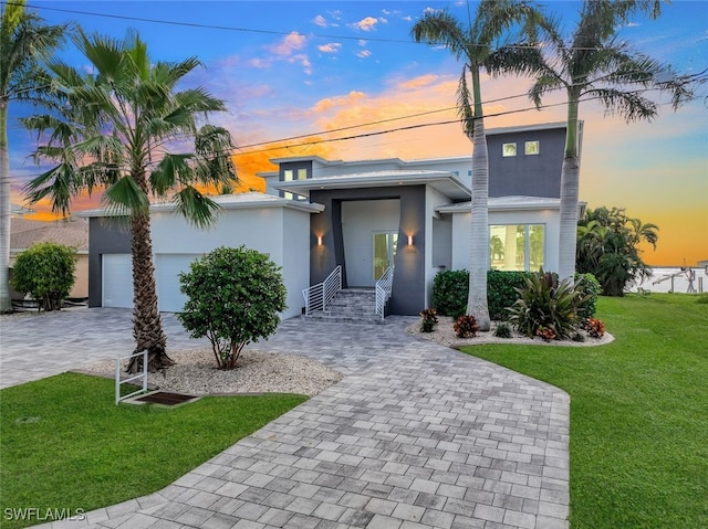 contemporary home featuring a yard