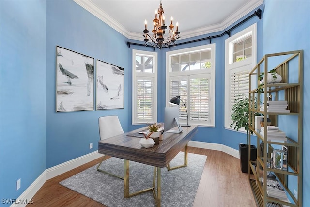 630 Mooring Line Dr, Naples, FL 34102 - home office featuring an inviting chandelier, ornamental molding, baseboards, and wood finished floors