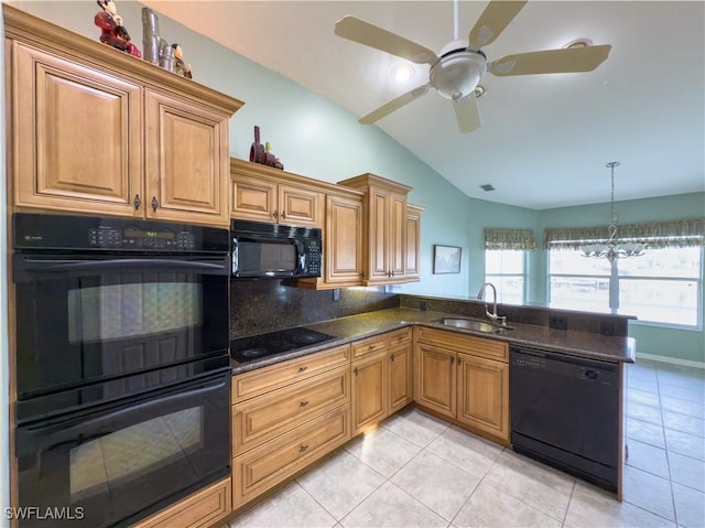 kitchen with black appliances, kitchen peninsula, sink, and vaulted ceiling