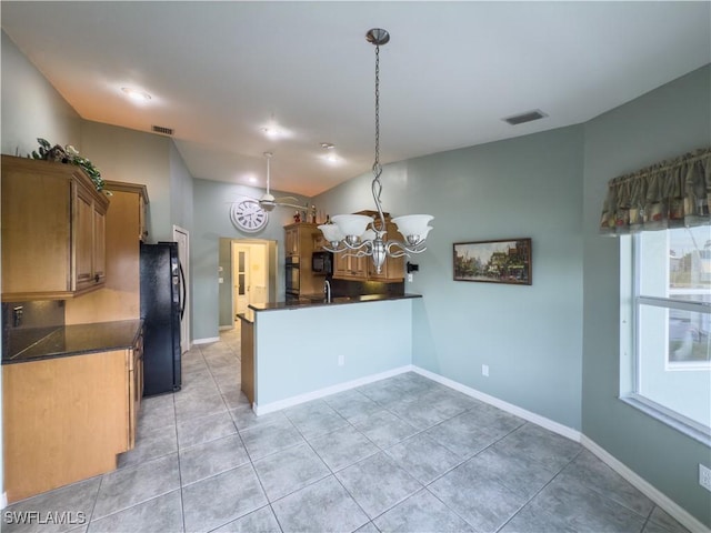 kitchen with kitchen peninsula, a chandelier, decorative light fixtures, light tile patterned flooring, and black appliances