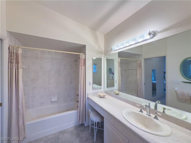 bathroom with tile patterned floors, vanity, and shower / tub combo with curtain