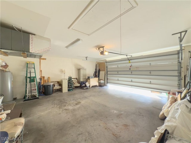 garage with a garage door opener and water heater