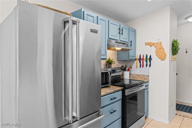 kitchen featuring tasteful backsplash, light tile patterned floors, stainless steel appliances, and blue cabinets