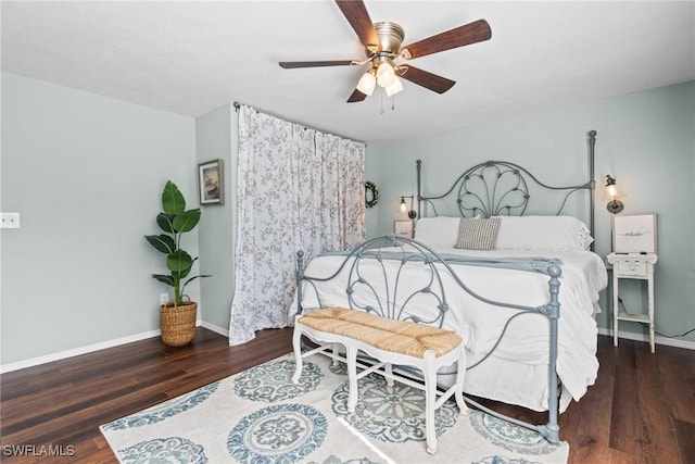 bedroom featuring ceiling fan and dark hardwood / wood-style flooring