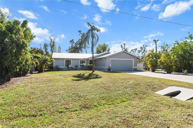 ranch-style home with a garage and a front yard