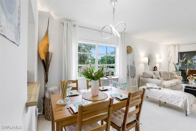 dining room featuring a notable chandelier