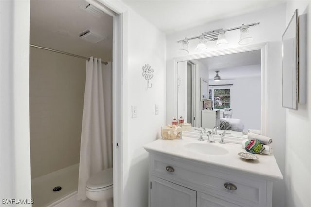 full bathroom with toilet, ensuite bath, a stall shower, and vanity