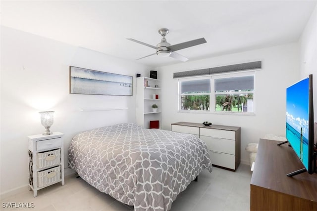 bedroom with baseboards and ceiling fan