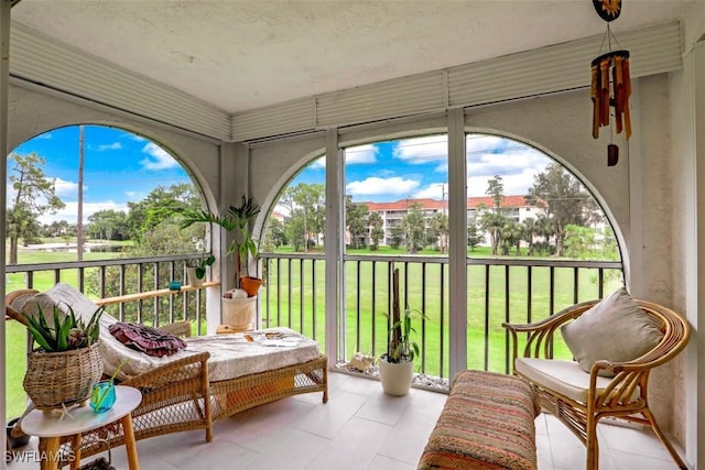 sunroom with plenty of natural light