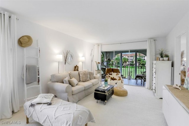 living room featuring light carpet