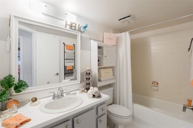 bathroom featuring visible vents, toilet, vanity, and shower / bathtub combination with curtain