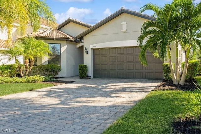 view of front of house with a garage