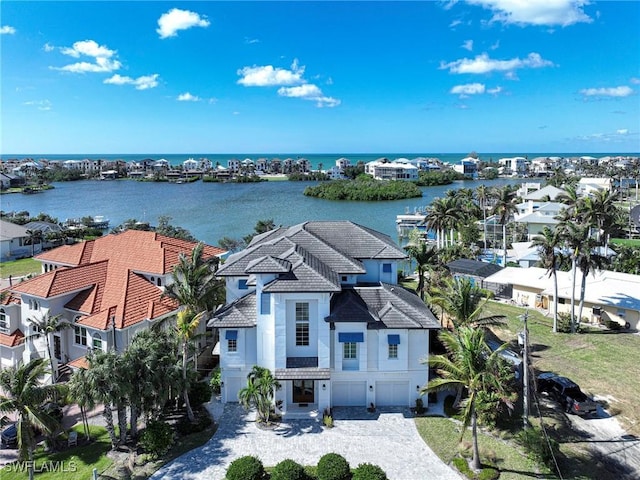 drone / aerial view with a water view