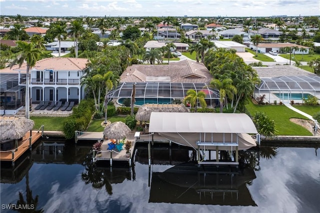 drone / aerial view featuring a water view