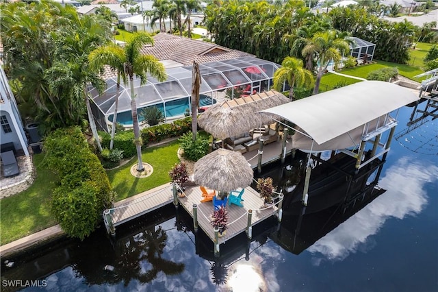 drone / aerial view featuring a water view