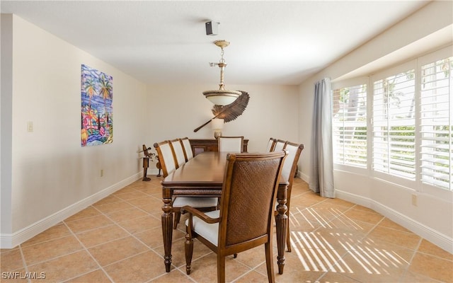 dining room featuring light tile patterned floors