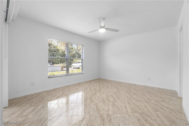 unfurnished room featuring ceiling fan