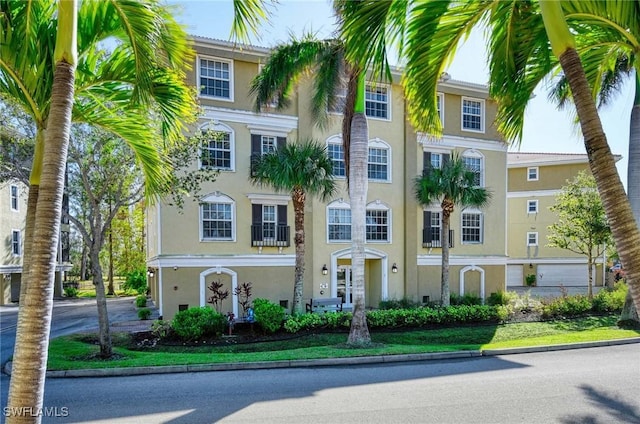 10041 Lake Cove Dr Unit 202, Fort Myers, FL 33908 - view of front of house featuring stucco siding