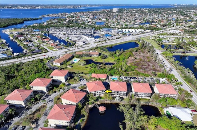 drone / aerial view with a water view