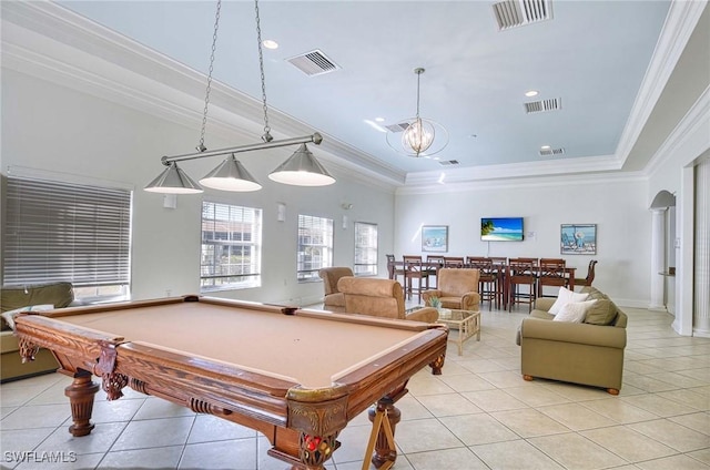 rec room with a raised ceiling, light tile patterned flooring, ornamental molding, and pool table