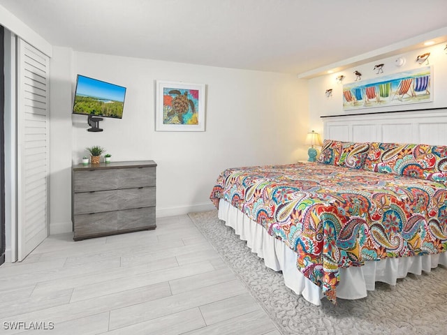 bedroom with light hardwood / wood-style flooring