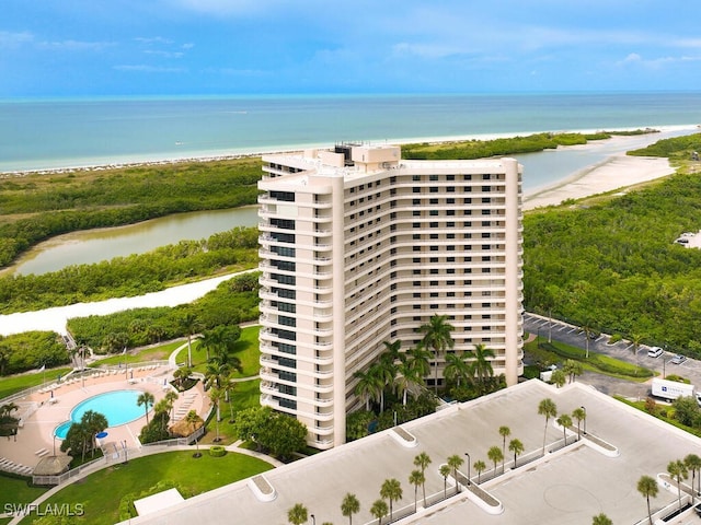 aerial view featuring a water view and a view of the beach