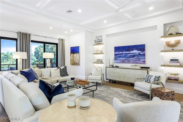 living room featuring coffered ceiling, beam ceiling, and light hardwood / wood-style flooring