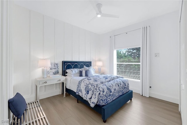 bedroom featuring ceiling fan and light wood-type flooring