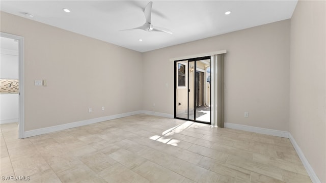 unfurnished room with ceiling fan