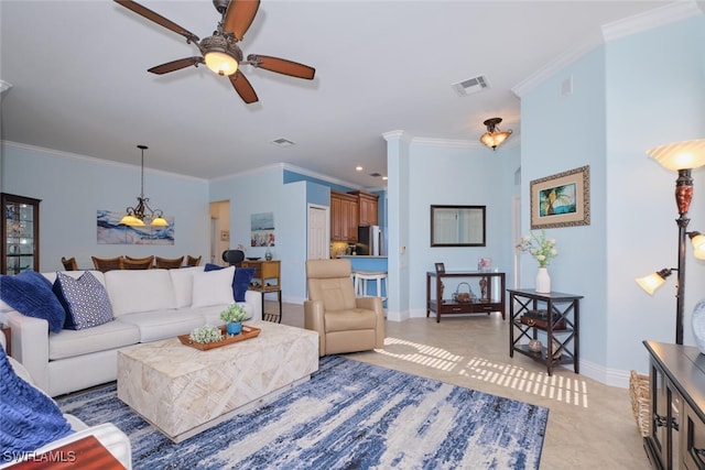 living room featuring ceiling fan and crown molding