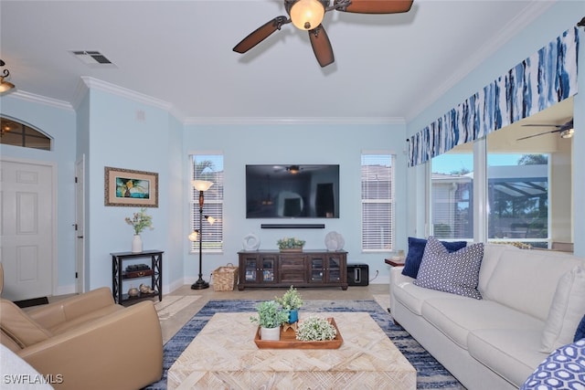 living room with ornamental molding