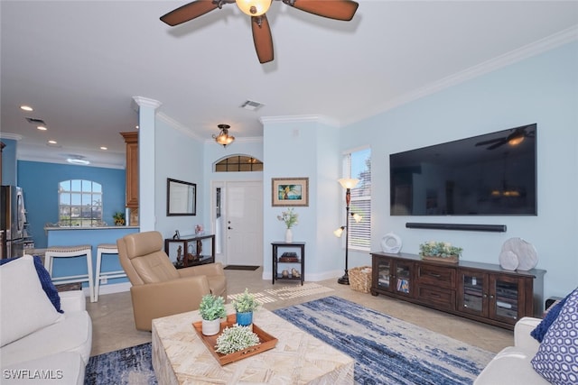 tiled living room featuring ornamental molding