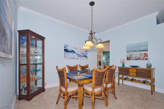 dining space with light tile patterned floors, crown molding, and a chandelier