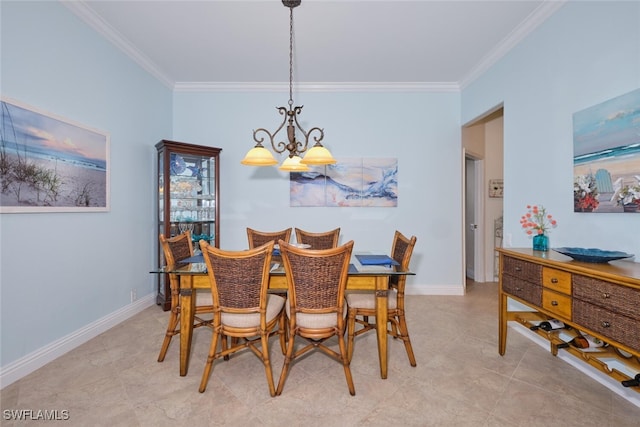 dining space featuring crown molding and a chandelier