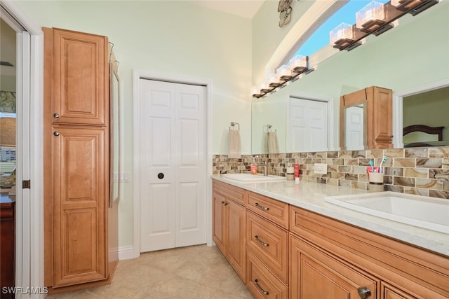 bathroom with vanity and tile patterned floors