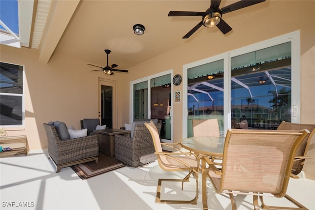 view of patio / terrace with glass enclosure