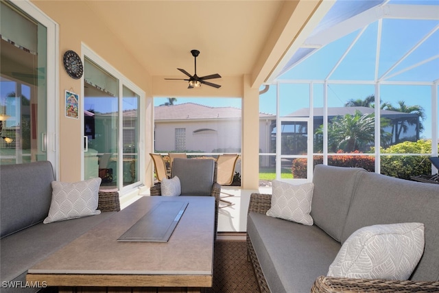 view of patio / terrace with outdoor lounge area, ceiling fan, and a lanai