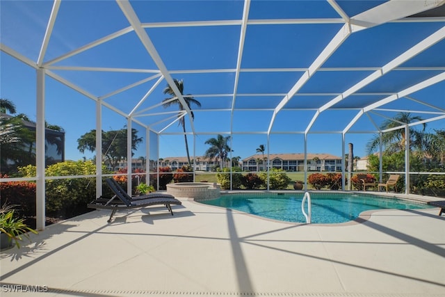 view of pool featuring a patio area and a lanai