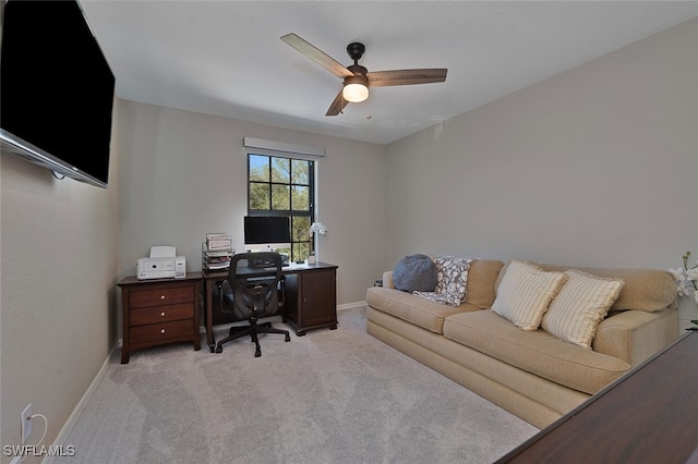 carpeted office with ceiling fan