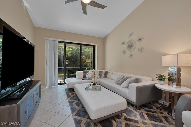 living room with ceiling fan, light tile patterned floors, and high vaulted ceiling