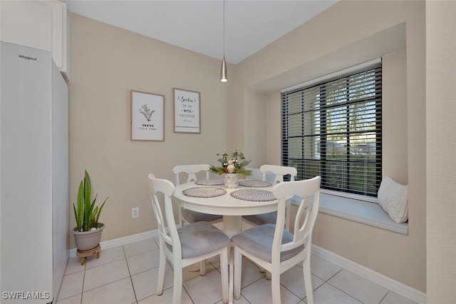 dining room with light tile patterned floors